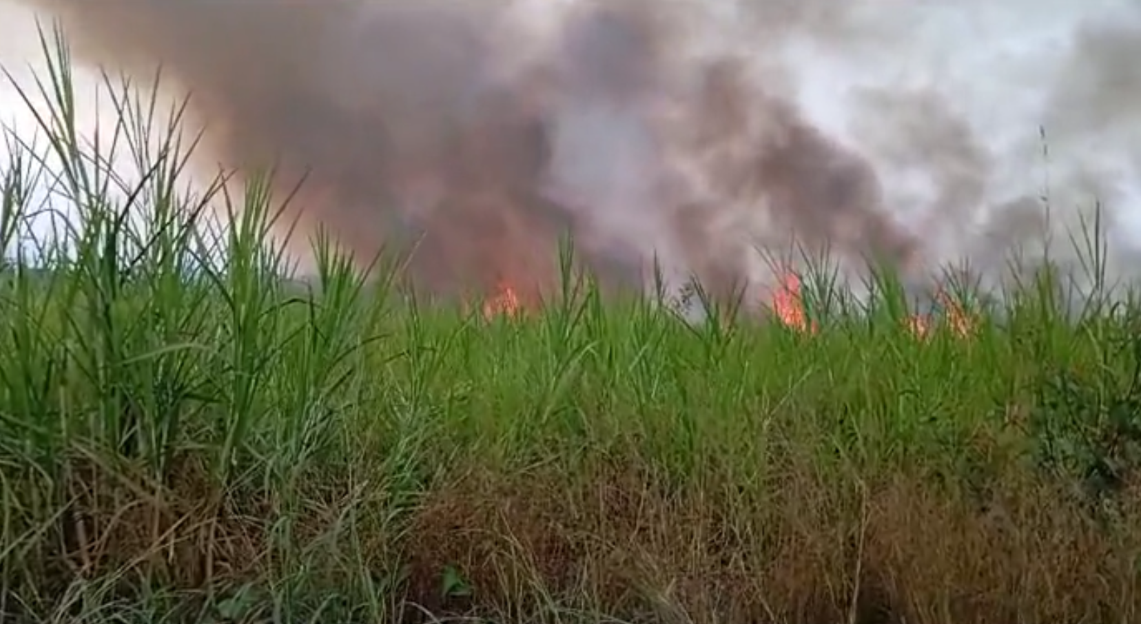 The flames encroaching close to a vital community building in Cutivereni.