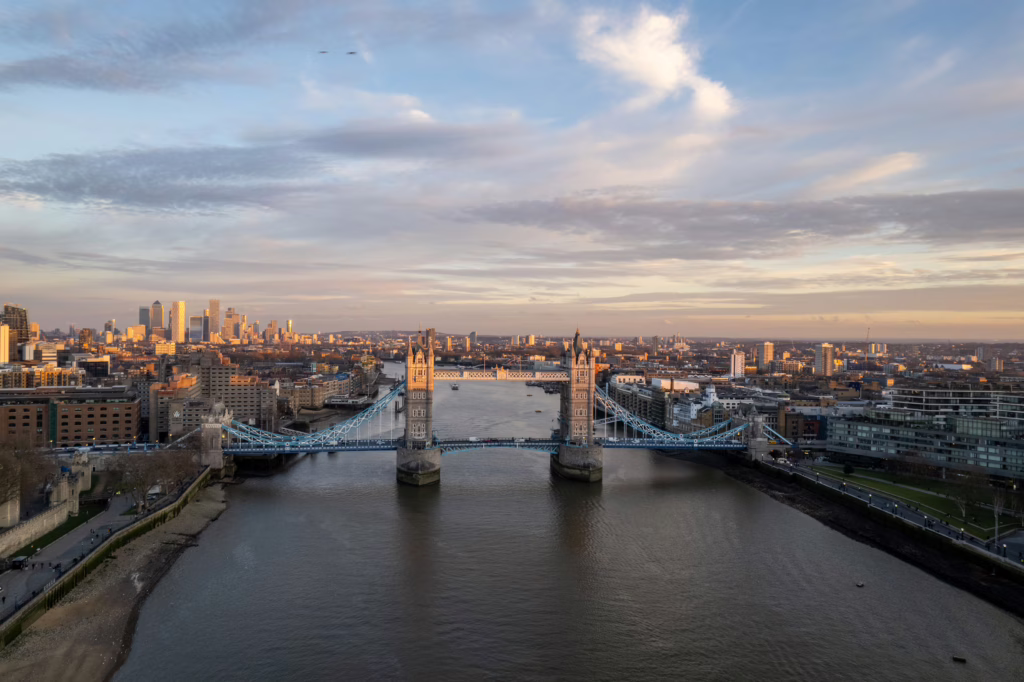A breathtaking aerial shot of London's Tower Bridge with the city skyline at dusk. Photo: Ollie Craig